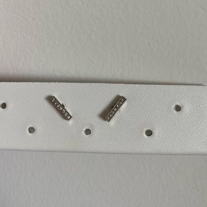 Silver bar stud earrings with cute crystals in the middle.